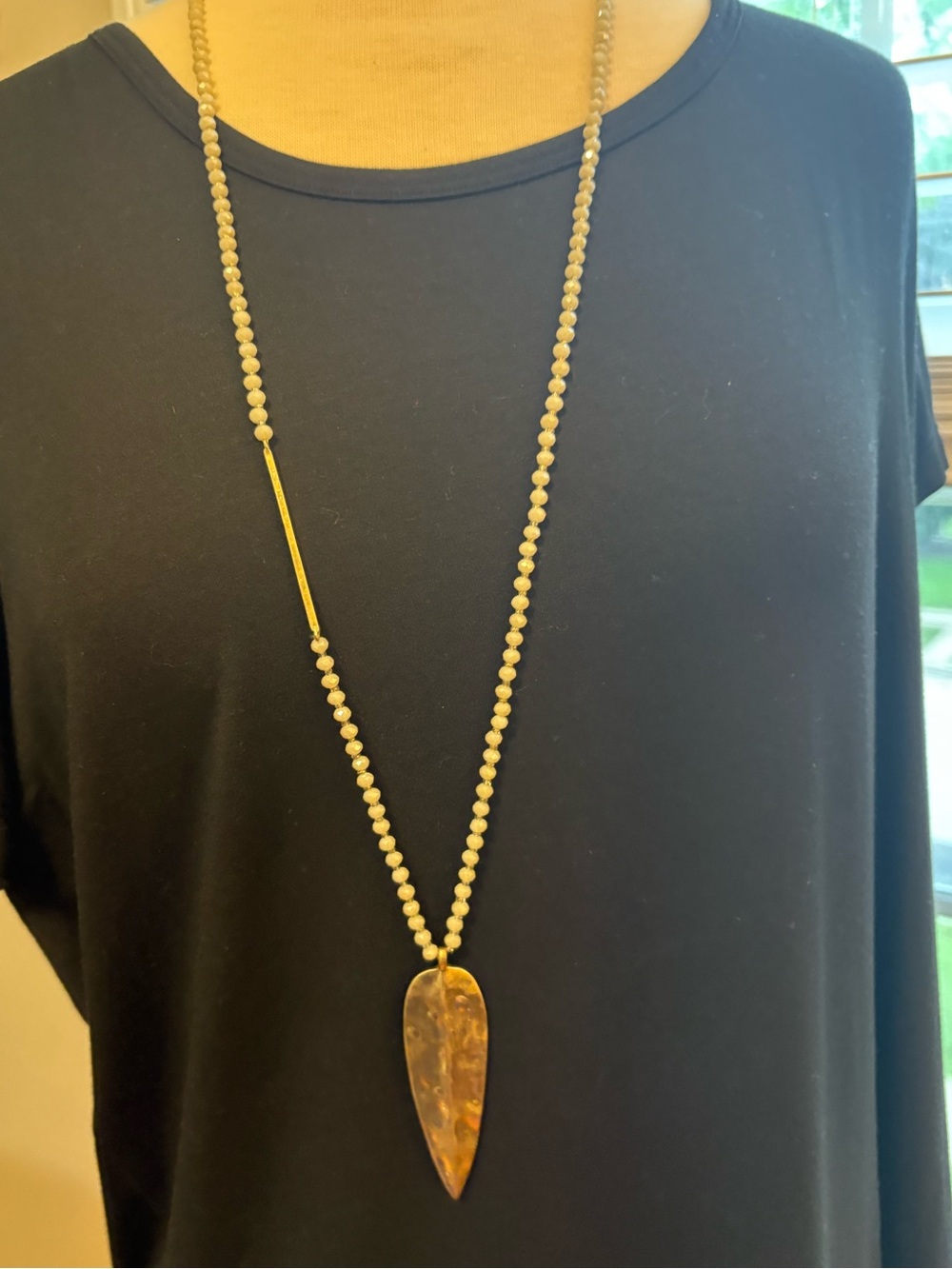 Long Necklace with Opal Colored Beads and Large Gold Teardrop Pendant